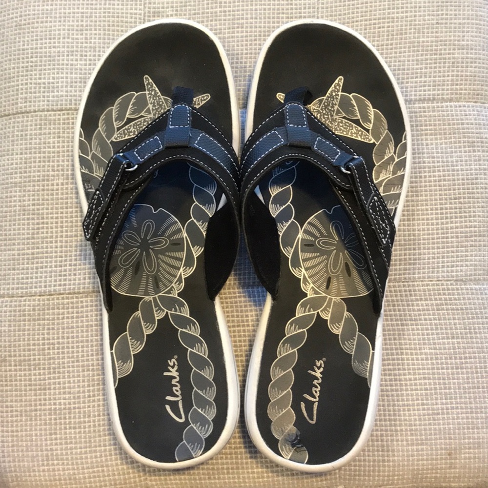 Clark’s flip flops
